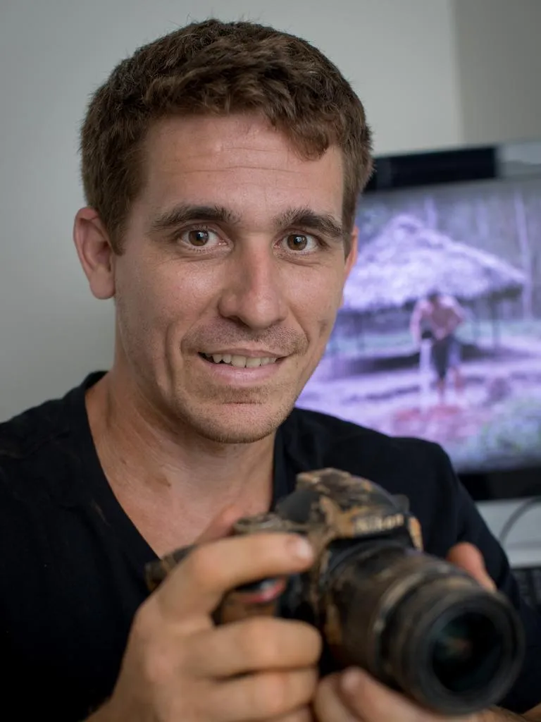 John Plant shows his camera Nikon.